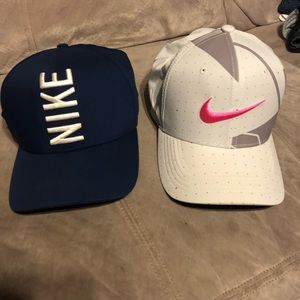 2 Nike golf hats worn once each!